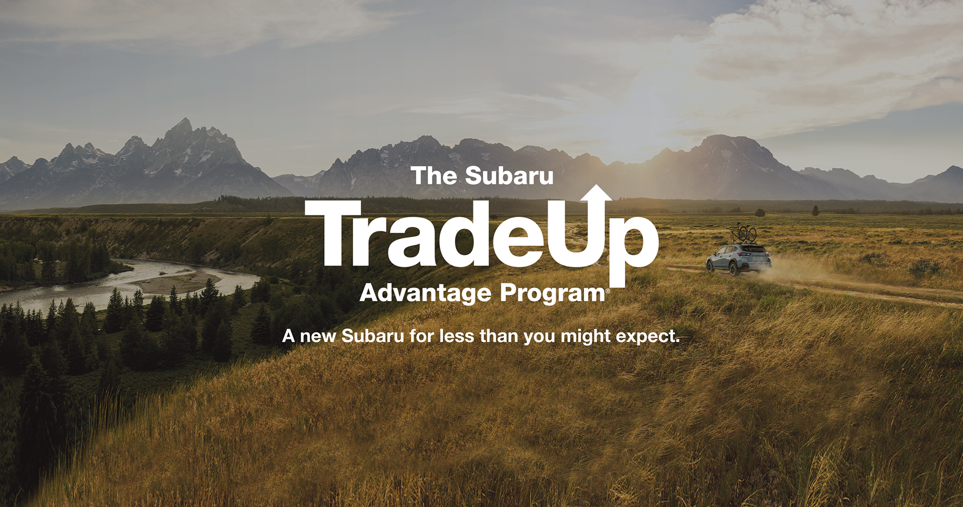 A blue 2023 Subaru Crosstrek in blue with the sentence &ldquo;The Subaru TradeUp Advantage Program&ldquo;.